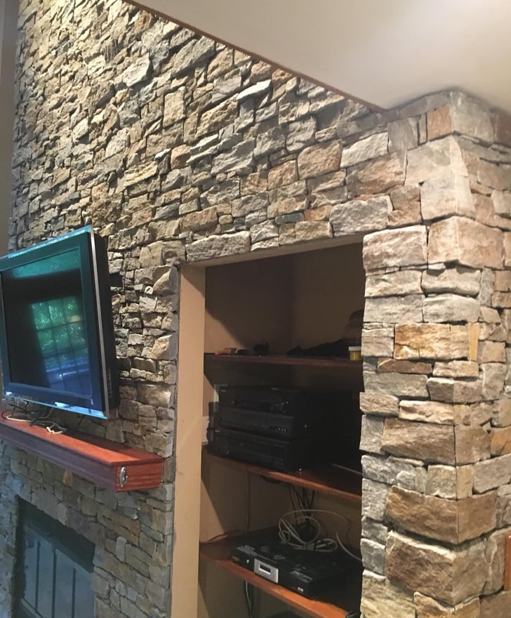 Custom stone tile fireplace design Custom stone tile fireplace design